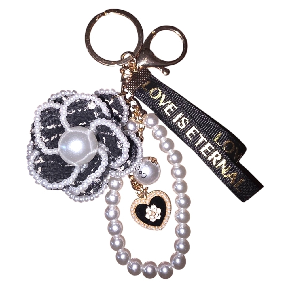 Elegant Black and White Keychain with Pearl Accents